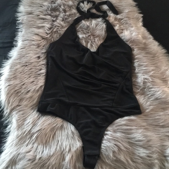 bebe Tops - Black halter bodysuit in size XS, NWOT